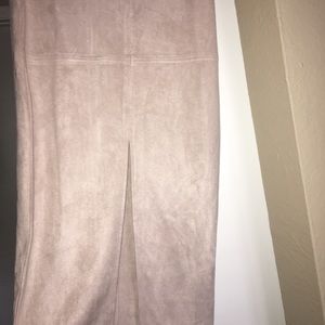 Light pink suede midi skirt with slit